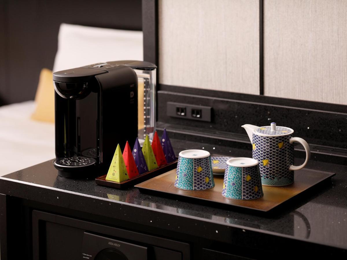 The Hotel Sanraku Kanazawa 21Th December 2022 Open Екстер'єр фото A Nespresso coffee machine in a hotel room